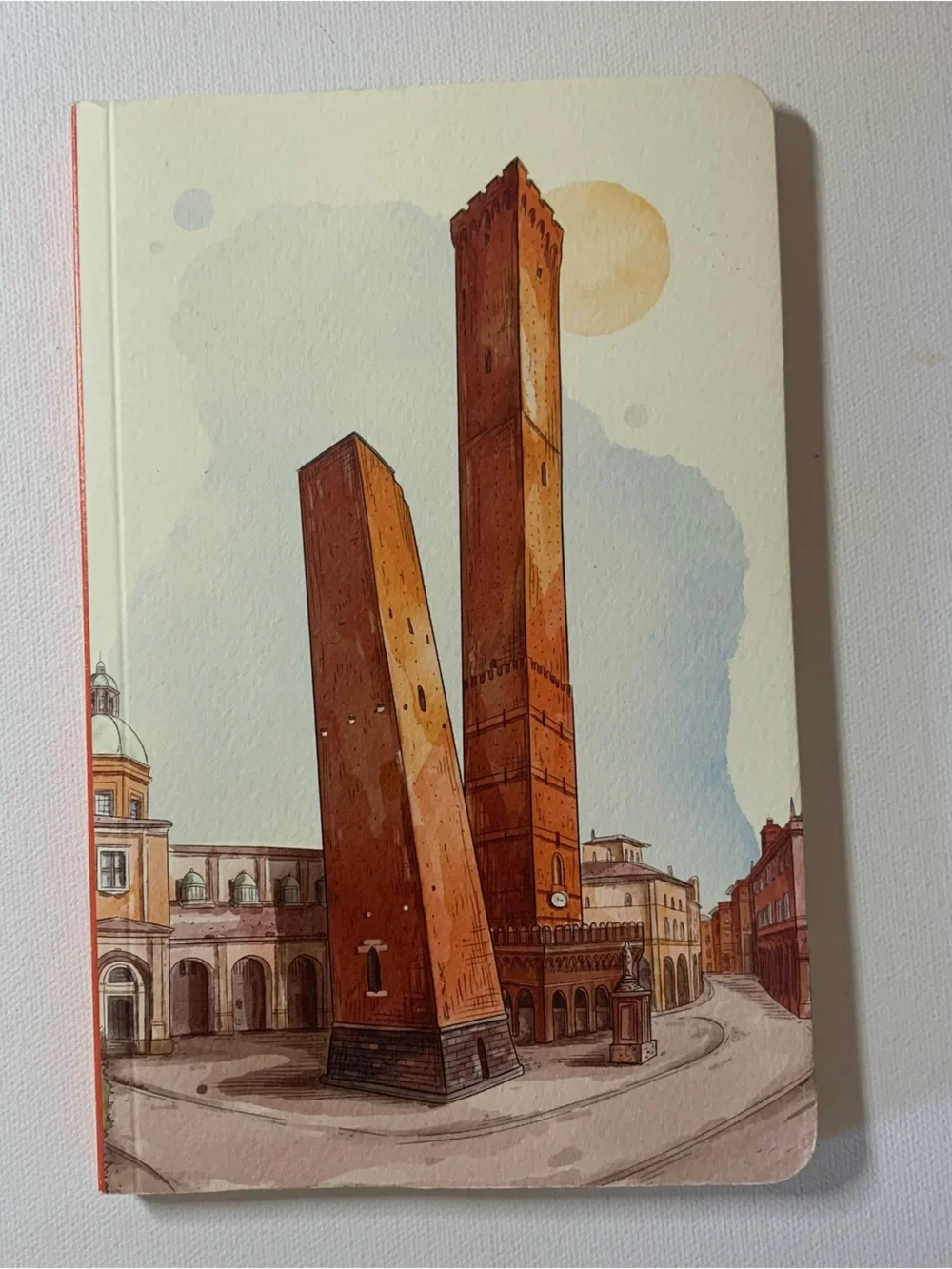 Bologna mini notebook with illustration of two leaning obelisks with buildings